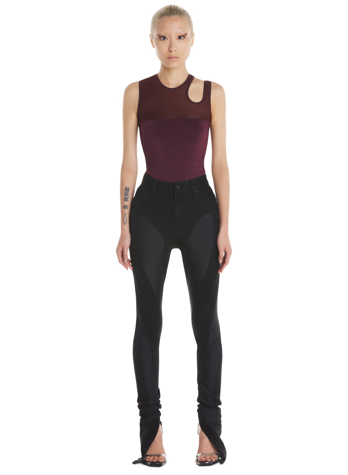 Slitted bi-material spiral jeans