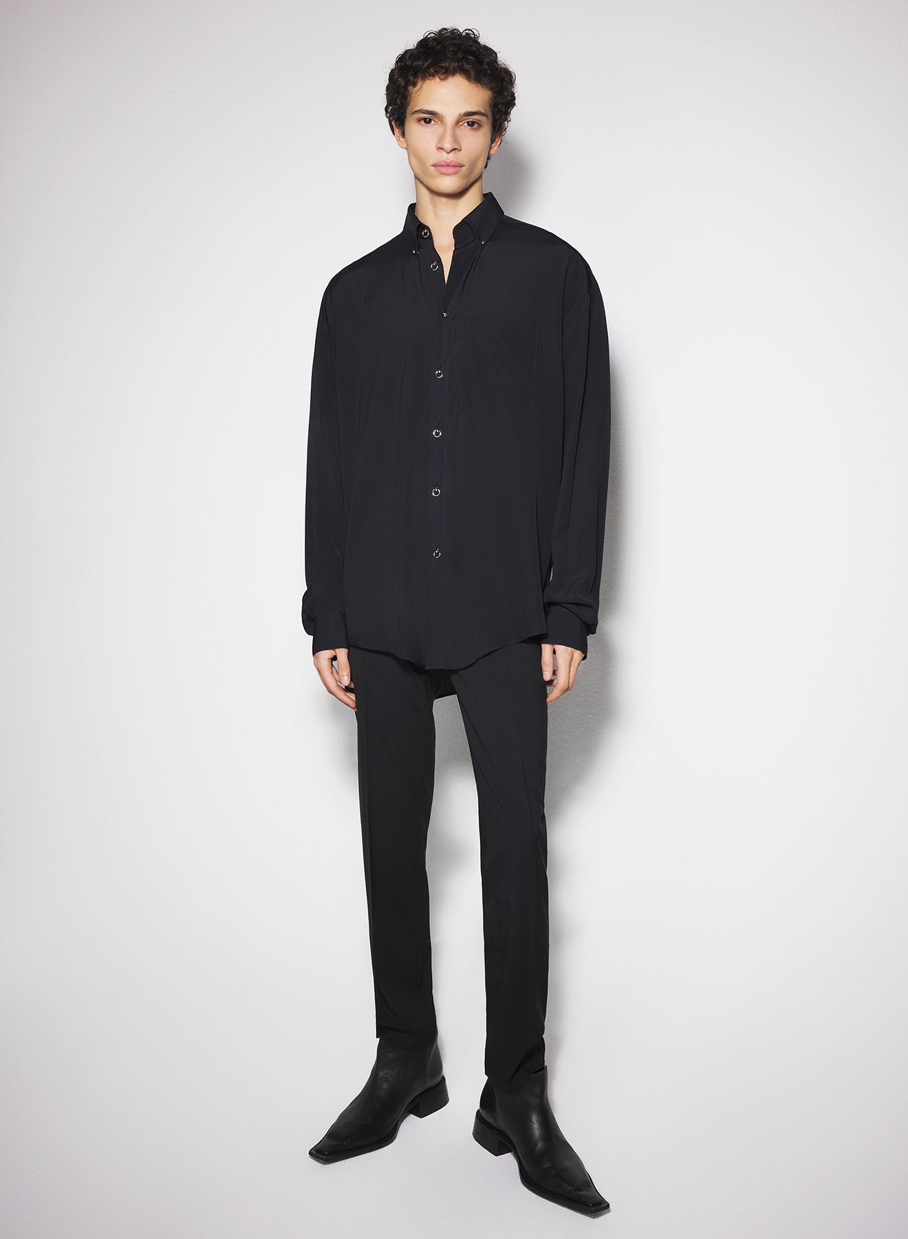 black fluid piercing shirt