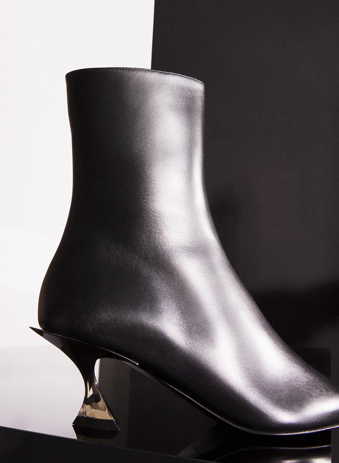 Black leather Fang 55 ankle boots