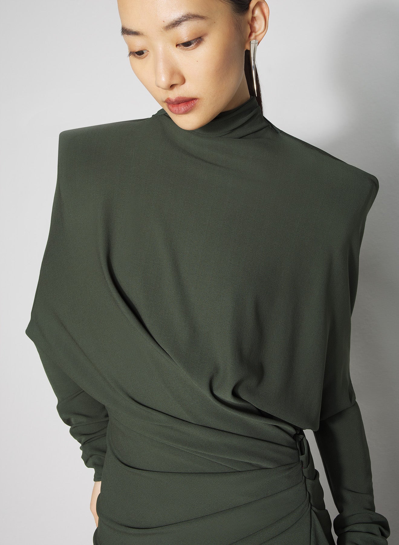 green draped open-back dress