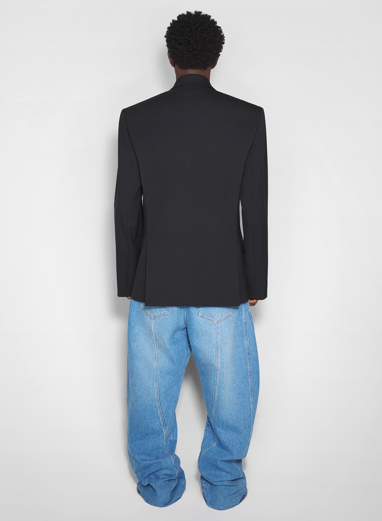 washed blue oversized spiral jeans