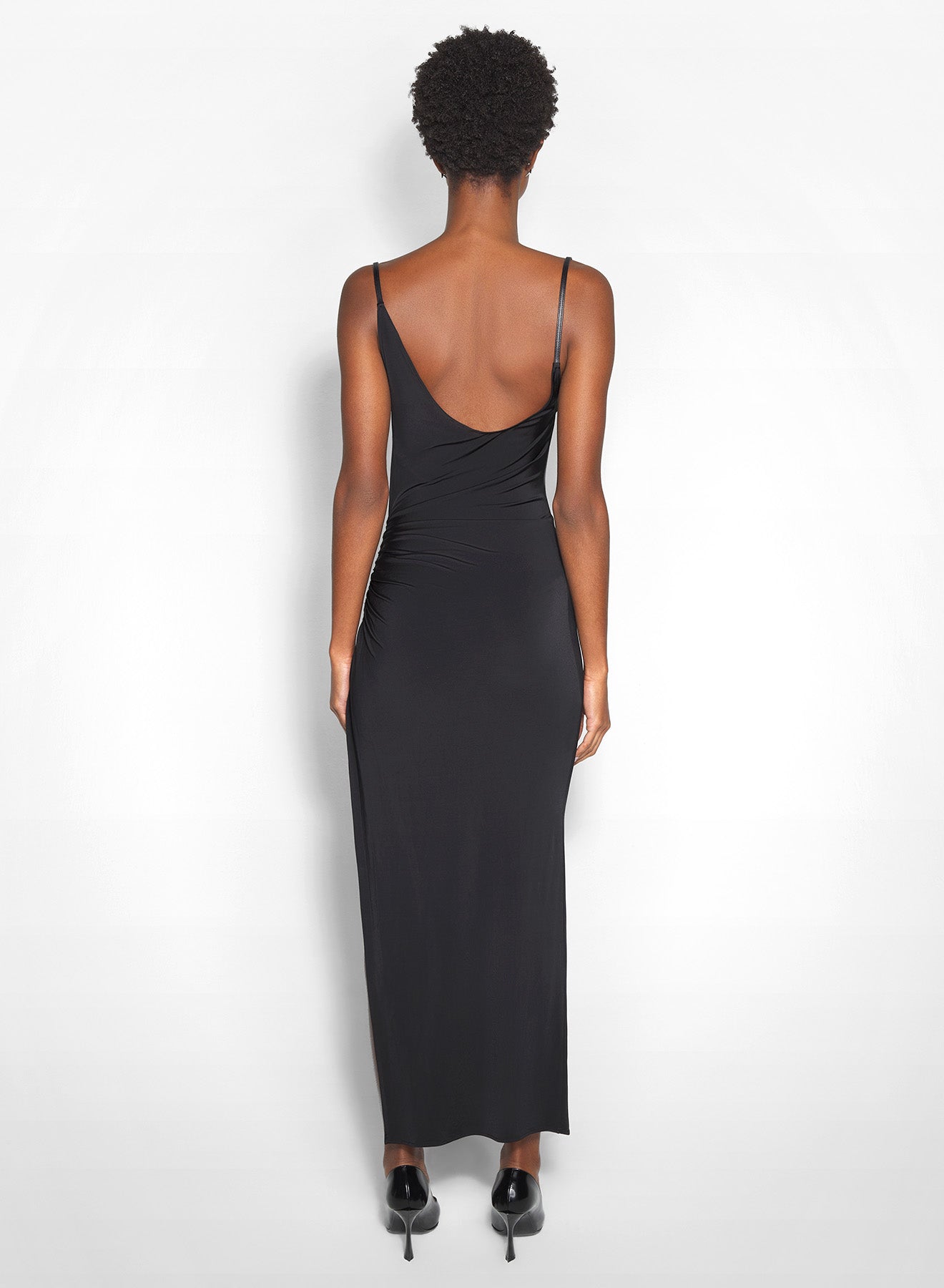 black asymmetrical buckled strap dress