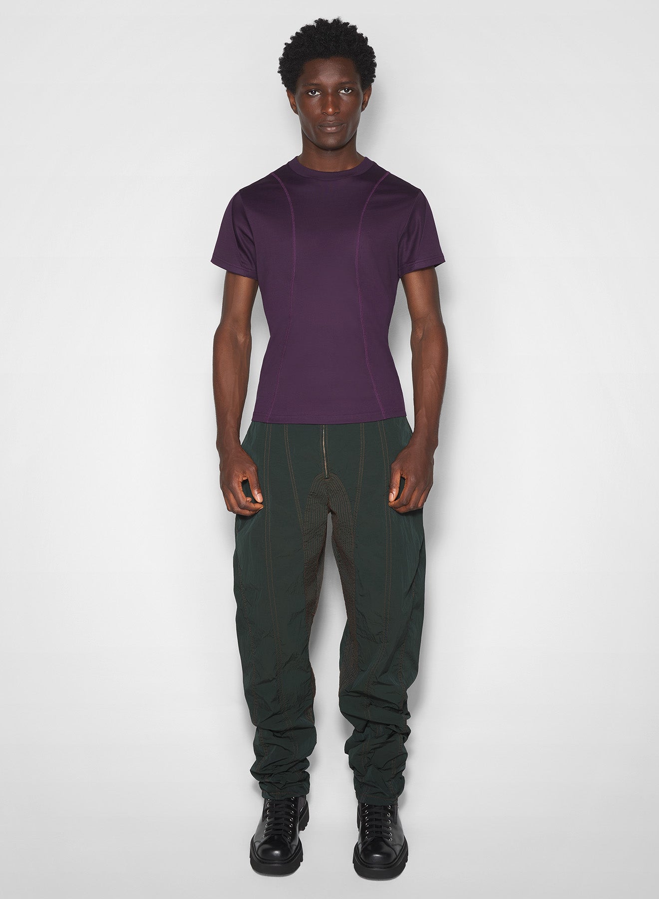 green stitched parachute pants