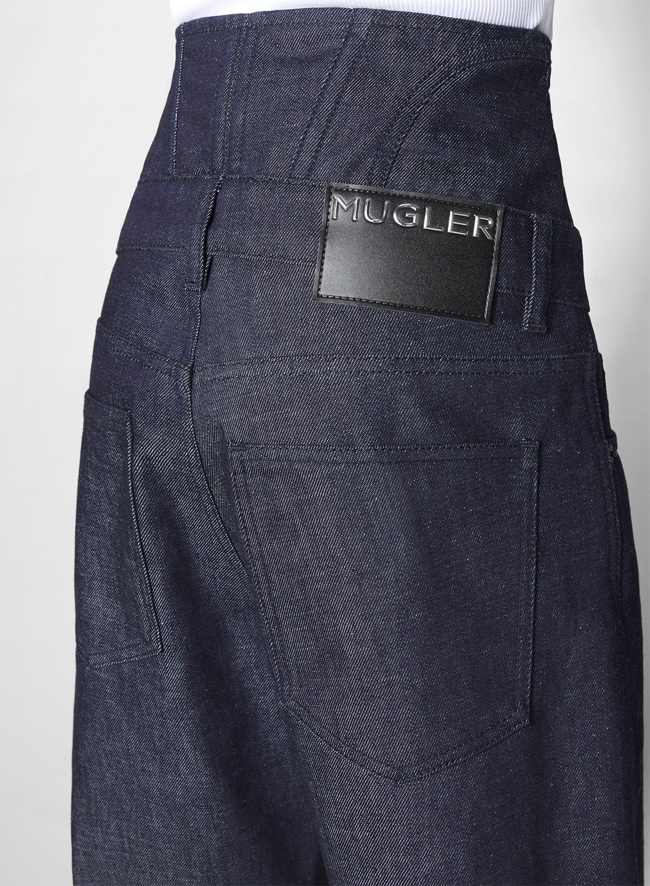 raw blue high-waisted corset jeans