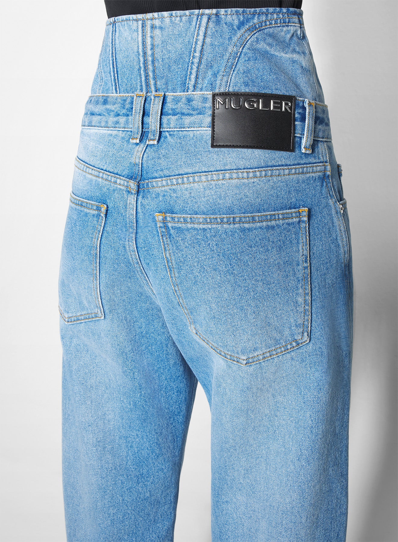 washed blue high-waisted corset jeans