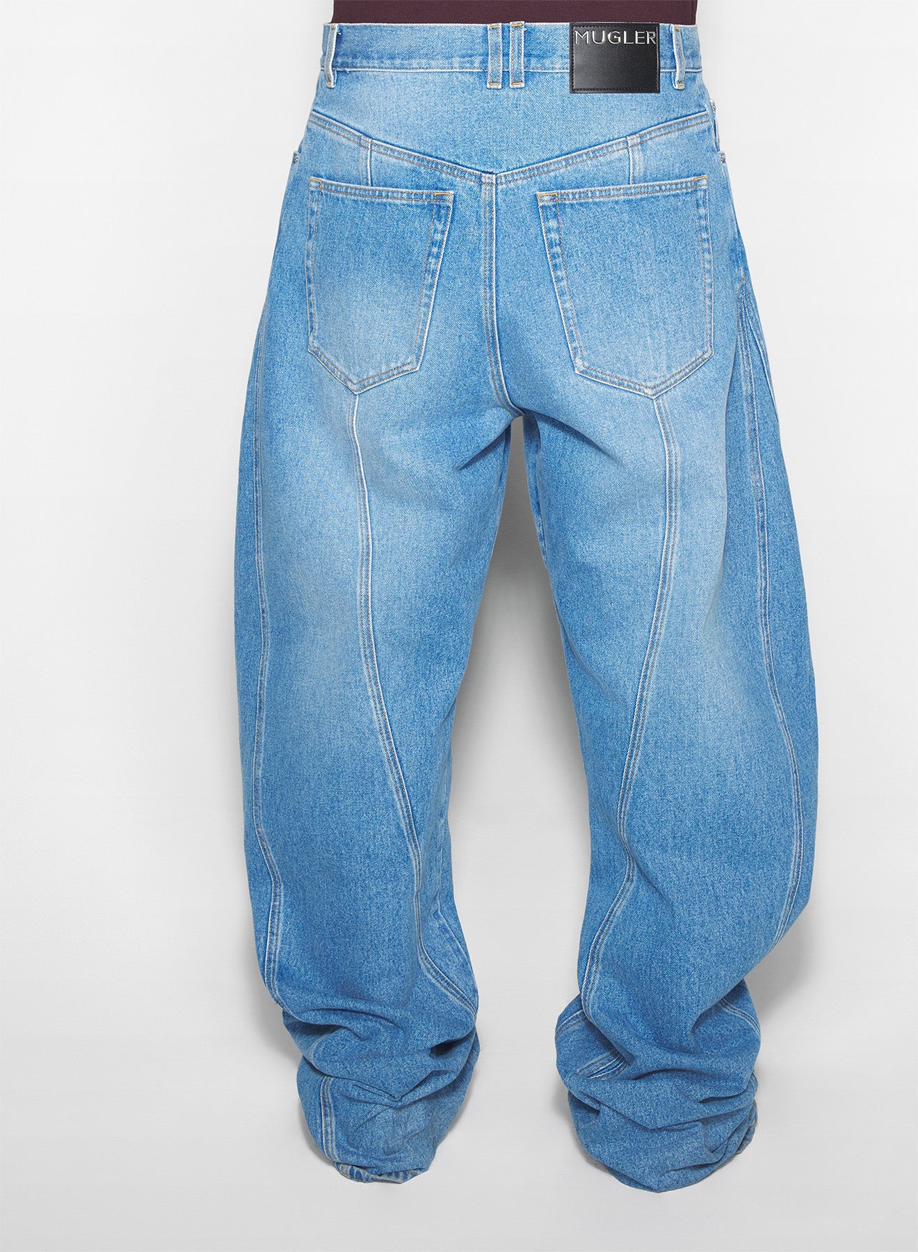 washed blue oversized spiral jeans