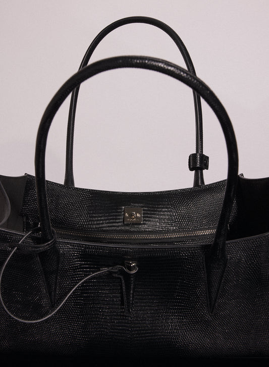 black embossed lizard leather fang bag