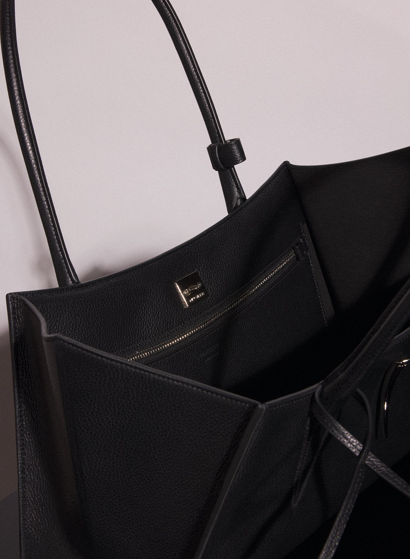 black grained leather fang bag