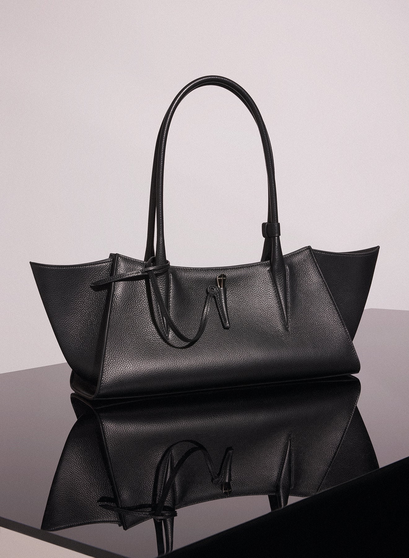 black grained leather fang bag