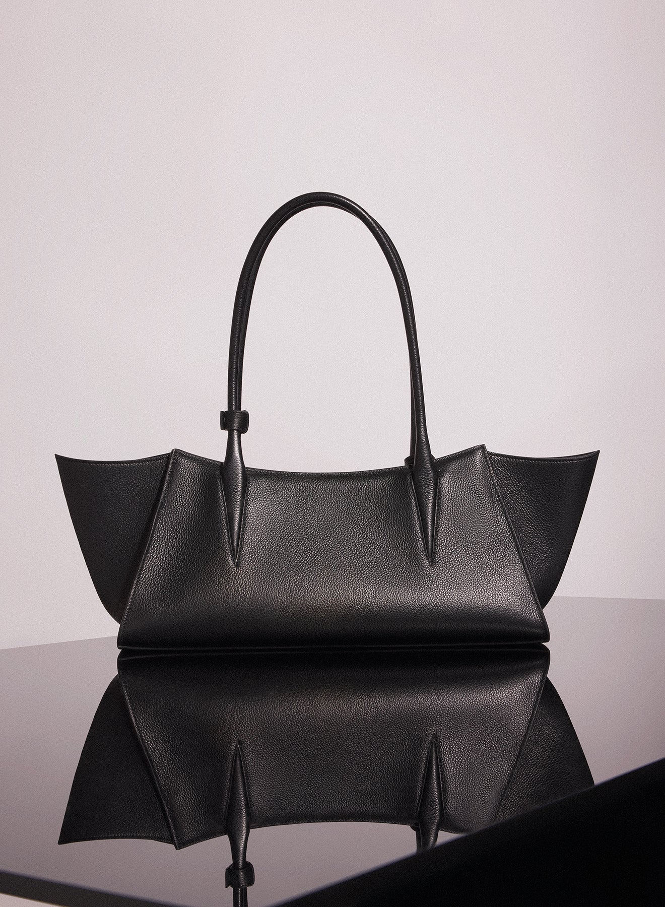 black grained leather fang bag