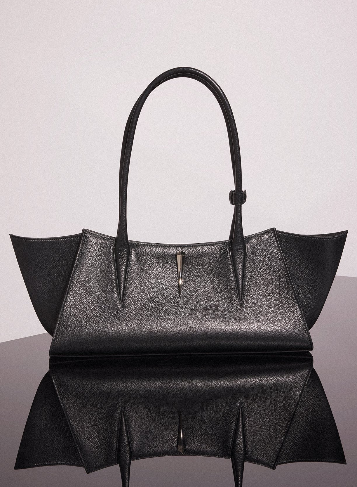 black grained leather fang bag