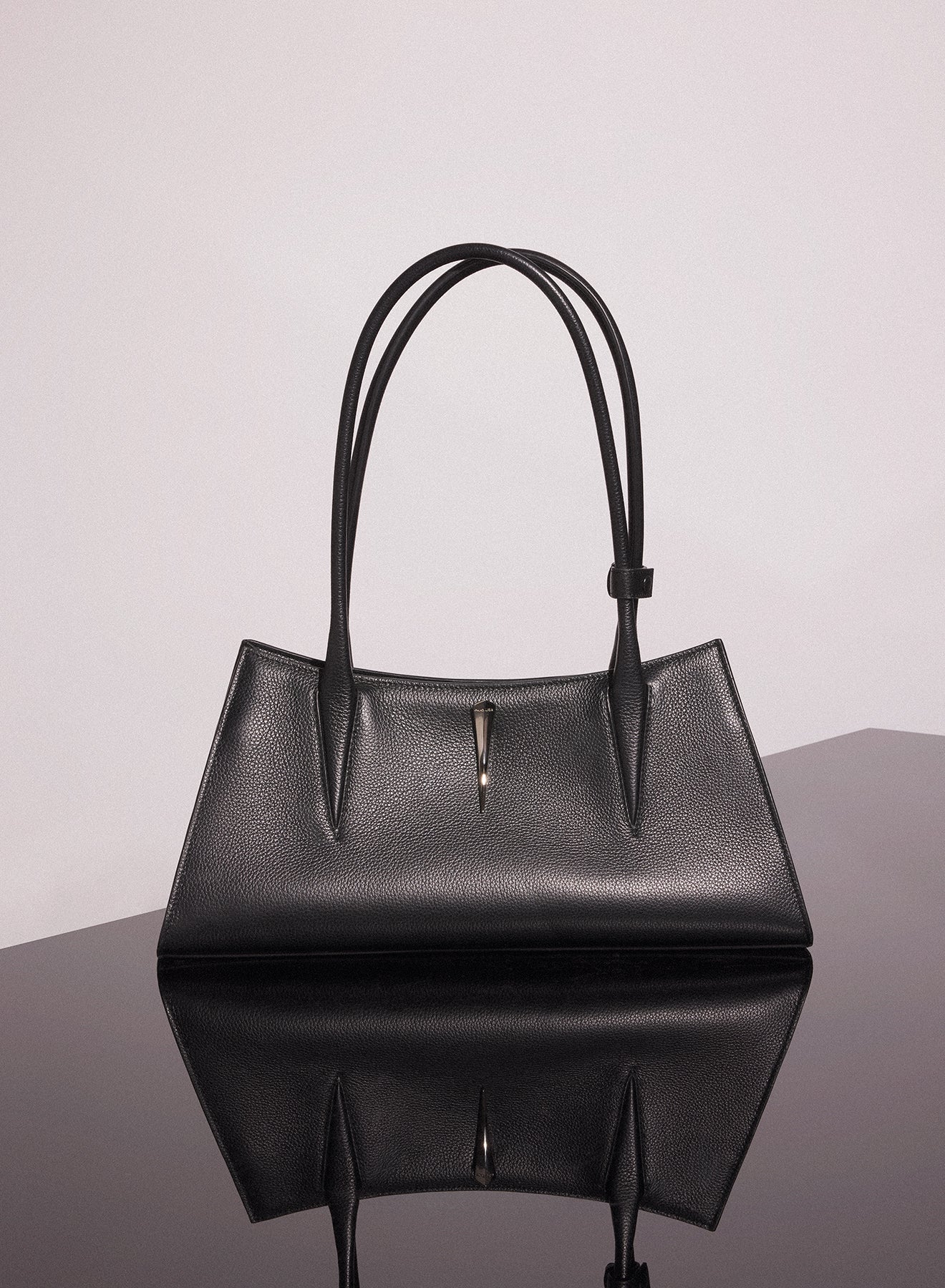 black grained leather fang bag
