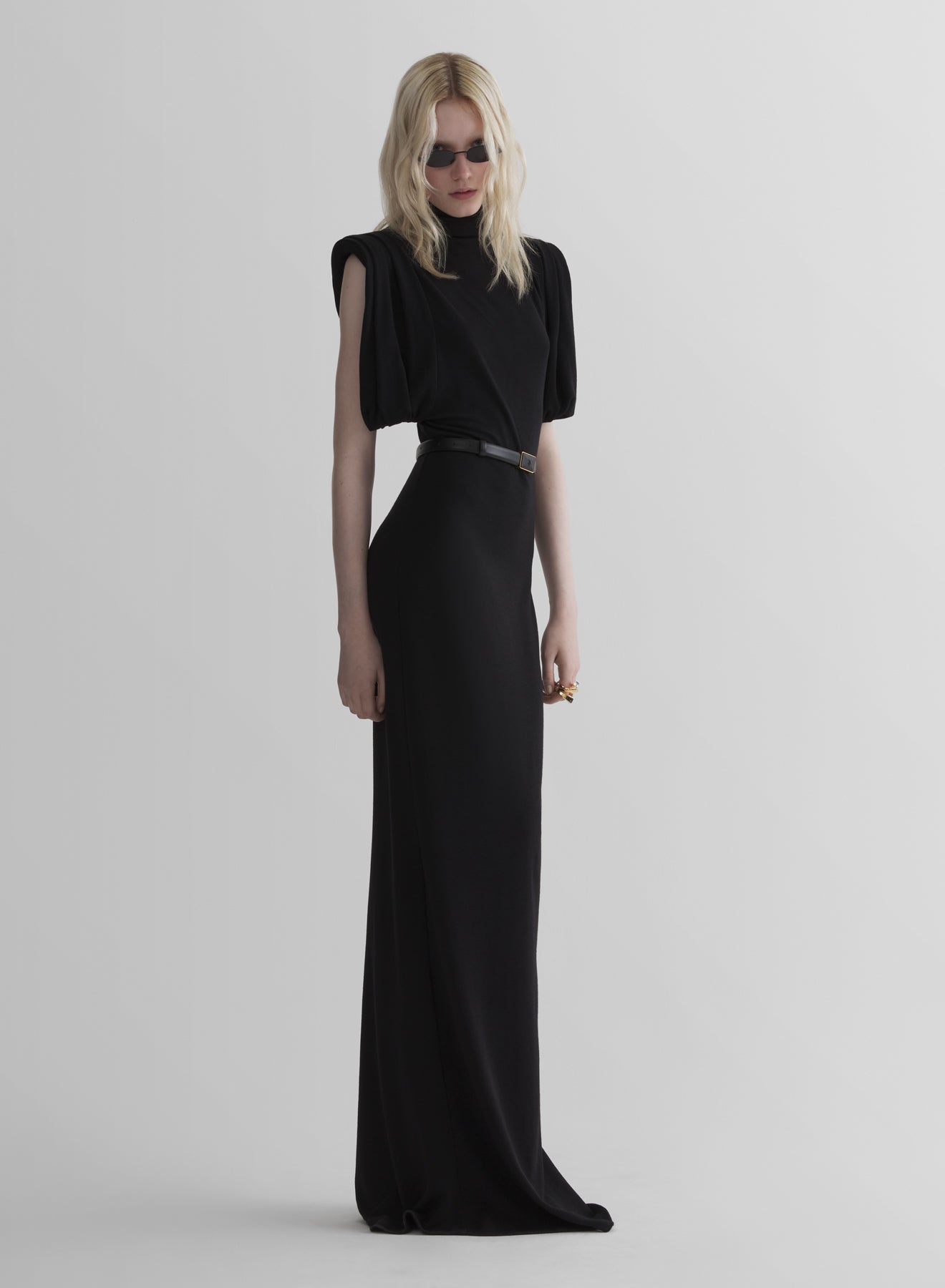 black draped sleeveless gown