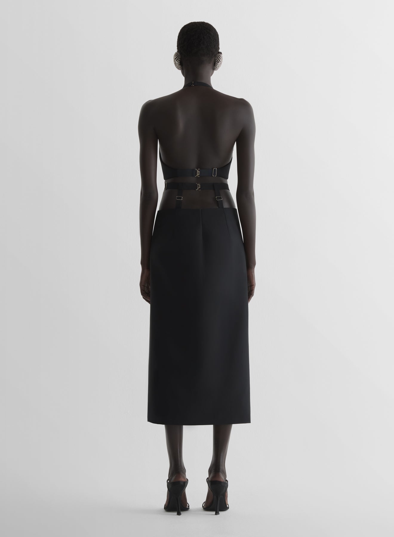 Suspended pencil skirt