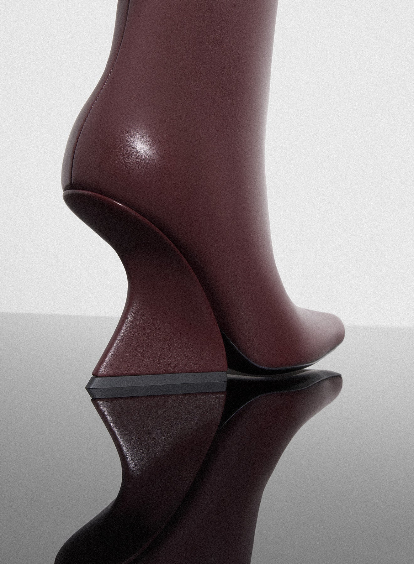 burgundy curved heel ankle boots