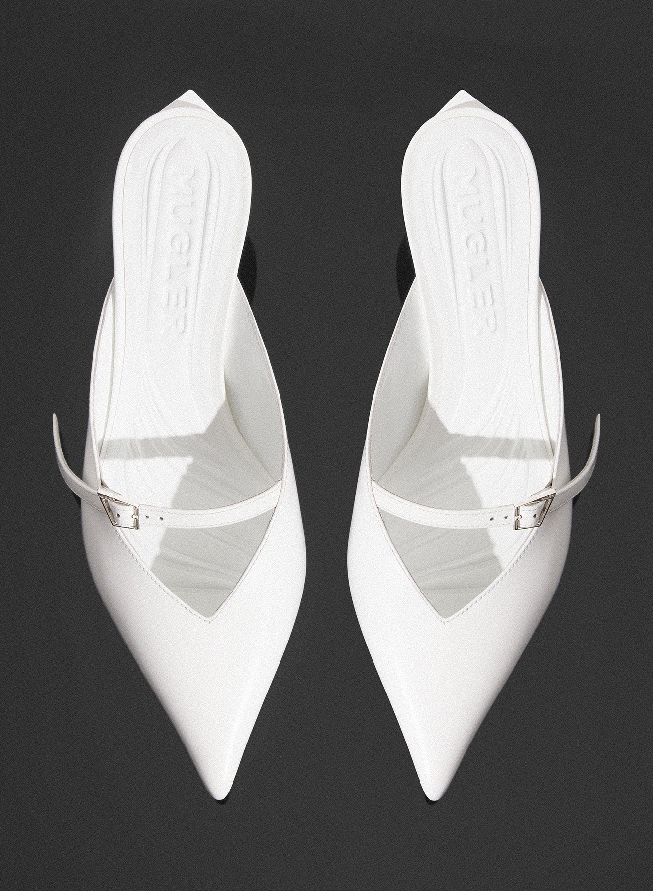 white Fang 55 mules with strap