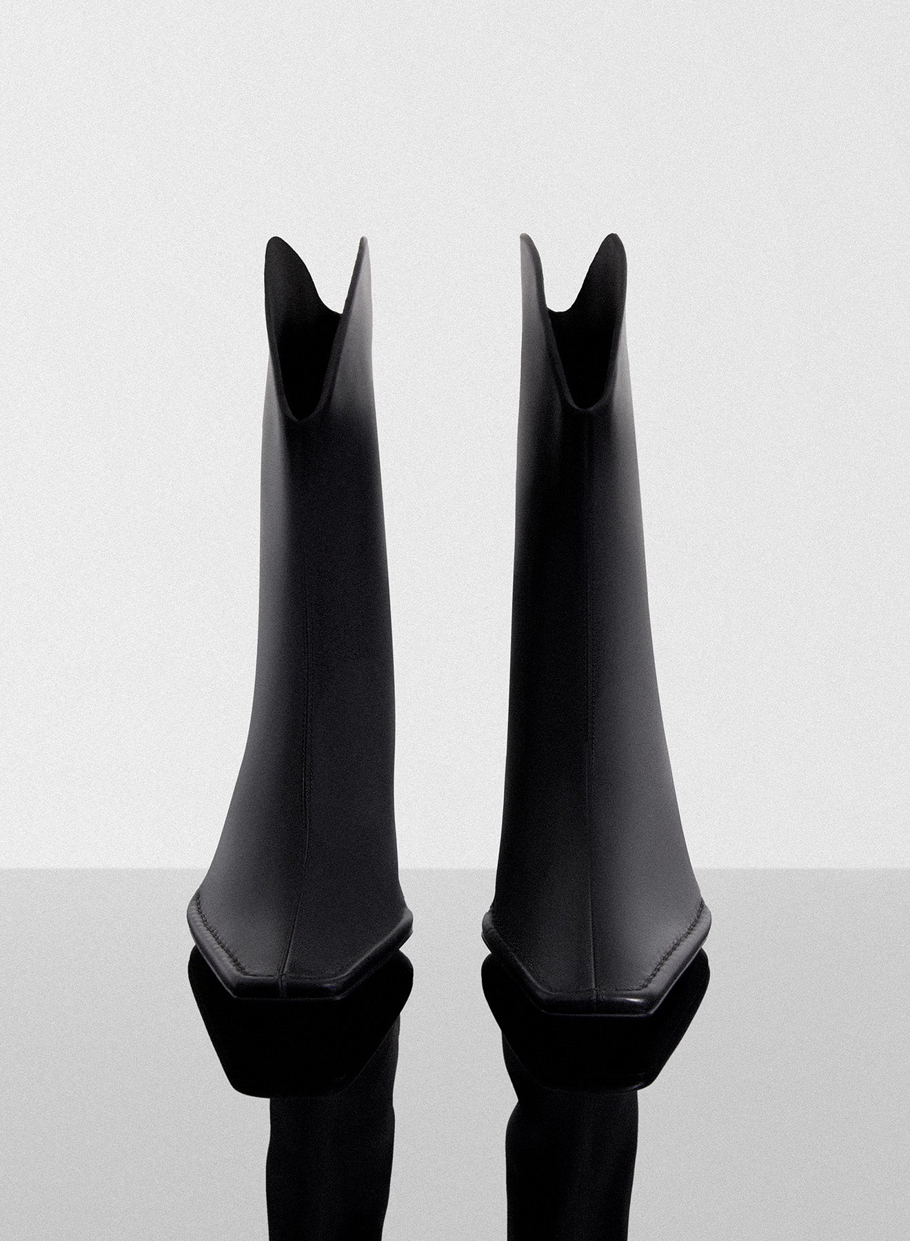 black leather Santiag boots