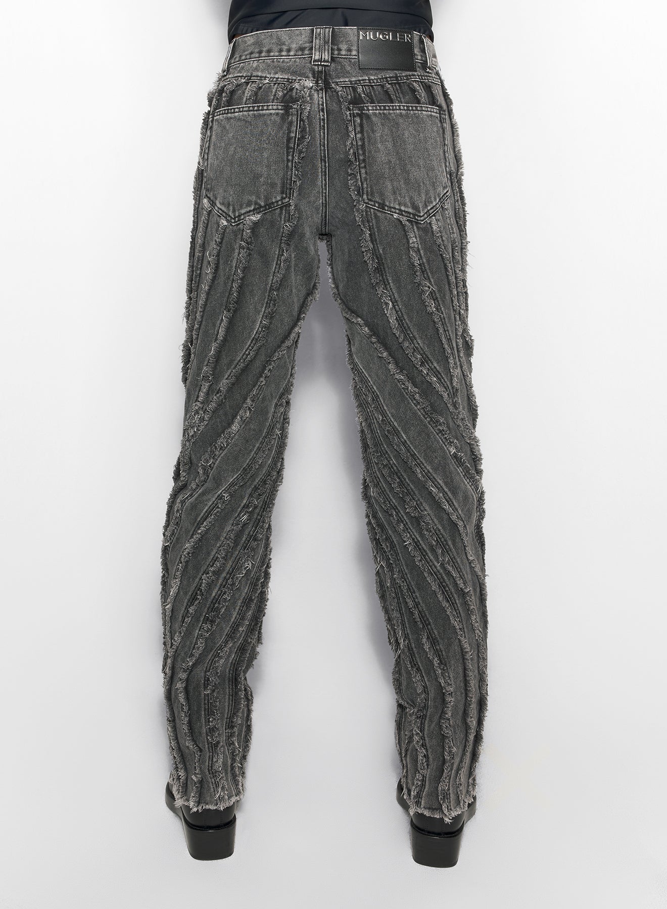 black raw edge spiral baggy jeans