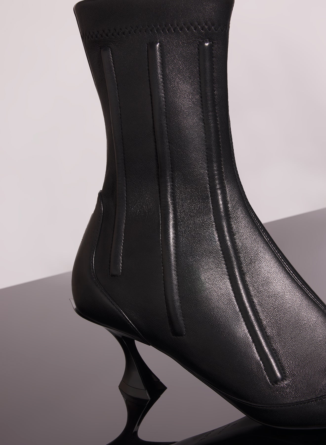 black boned leather fang 55 ankle boots