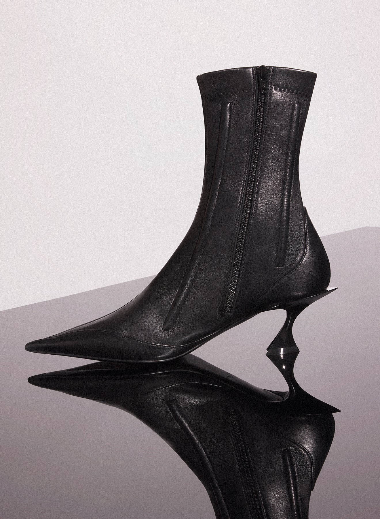 black boned leather fang 55 ankle boots