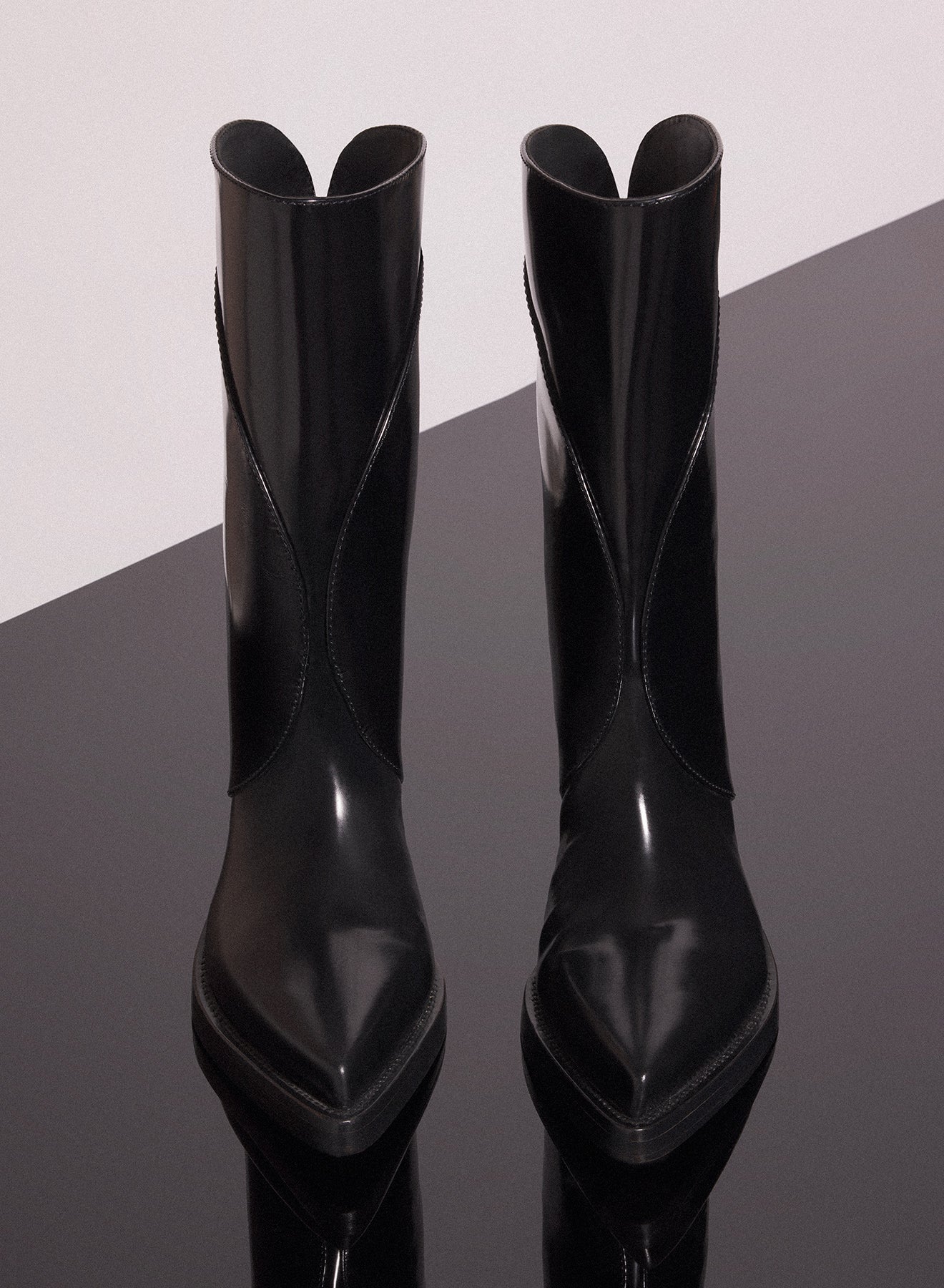 black shiny leather santiag boots