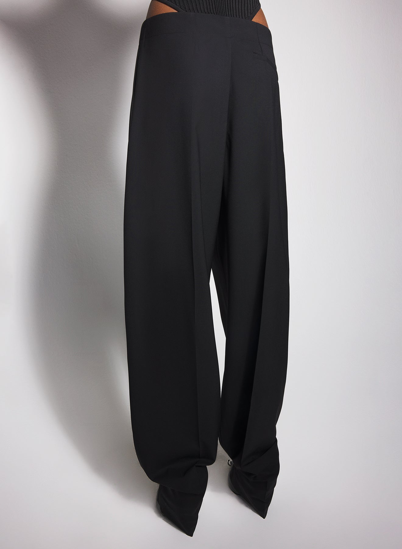 black pierced loose tailored trousers