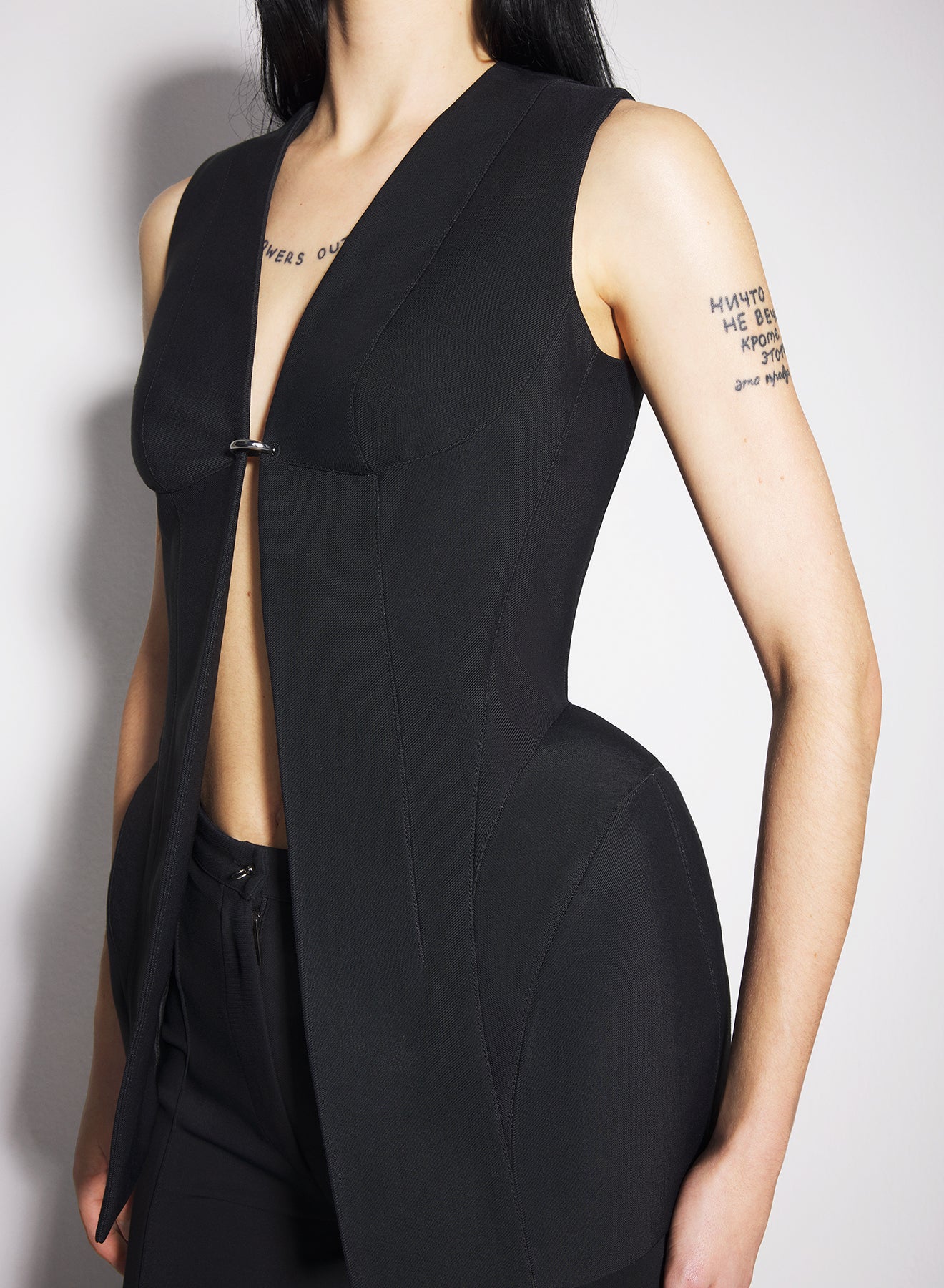 black corseted pierced vest