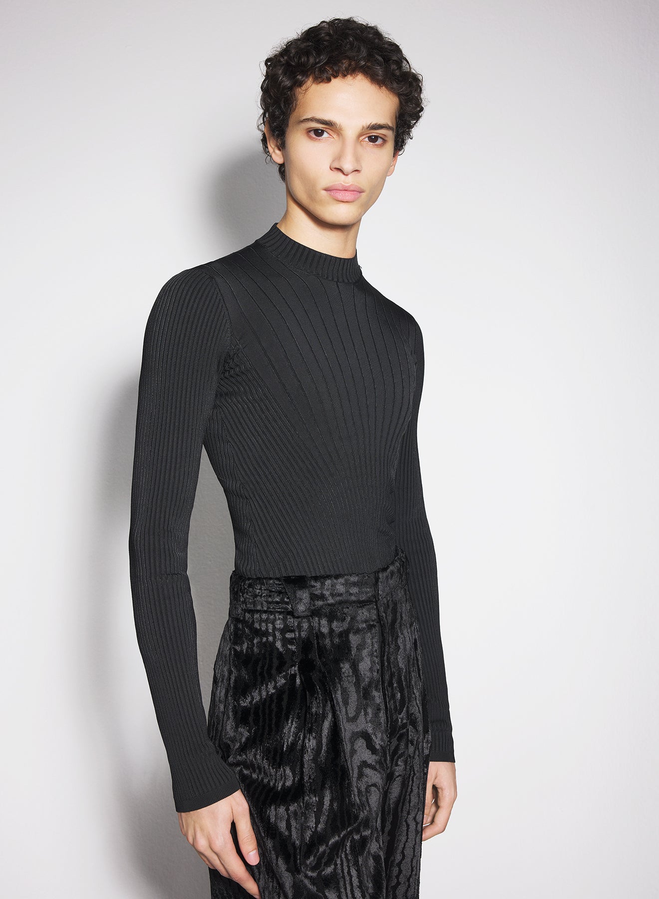 black sculpting knit top