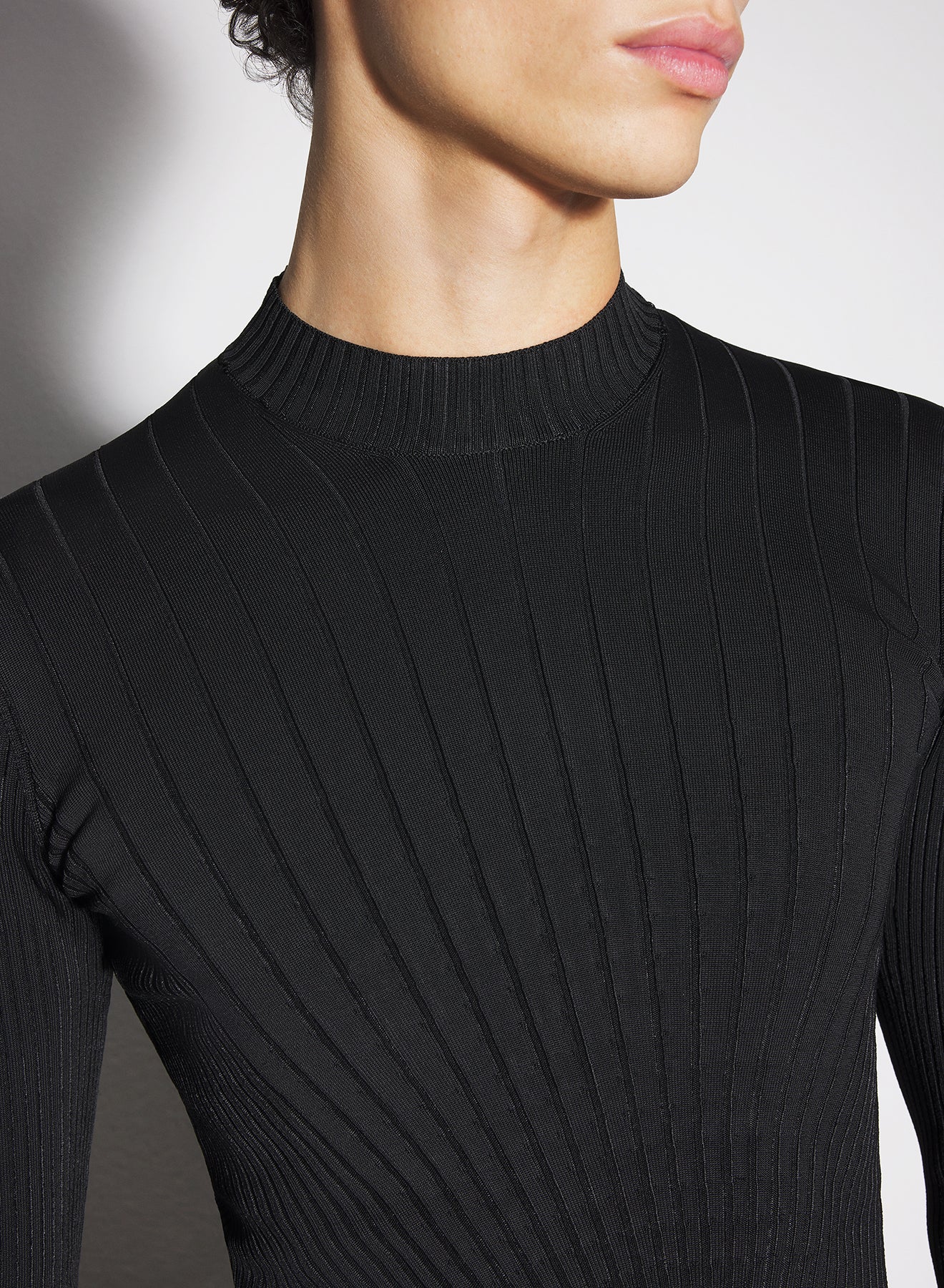 black sculpting knit top