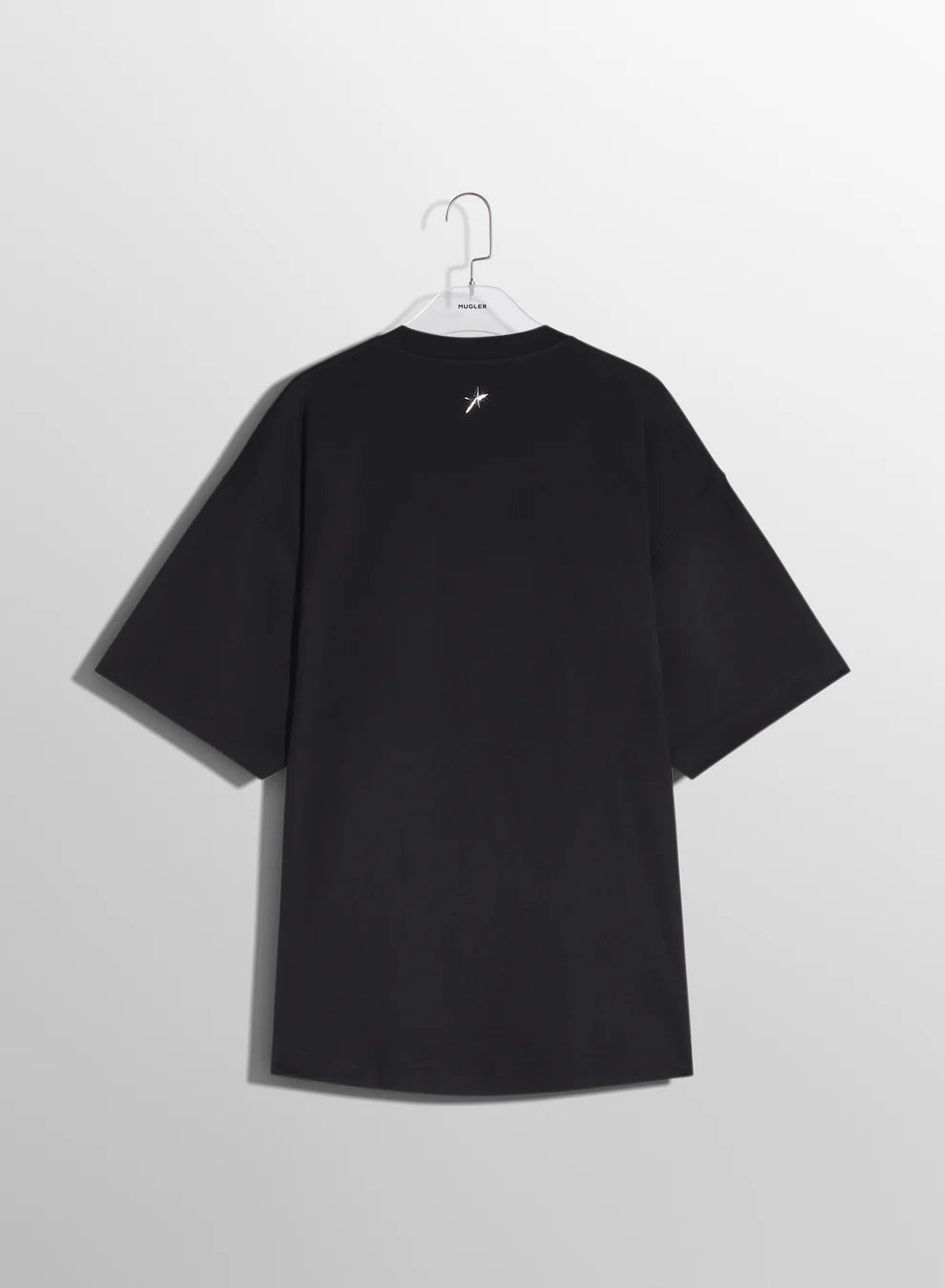 black oversized pierced t-shirt