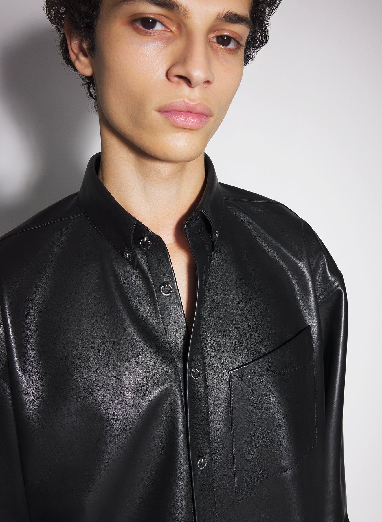 black leather piercing shirt