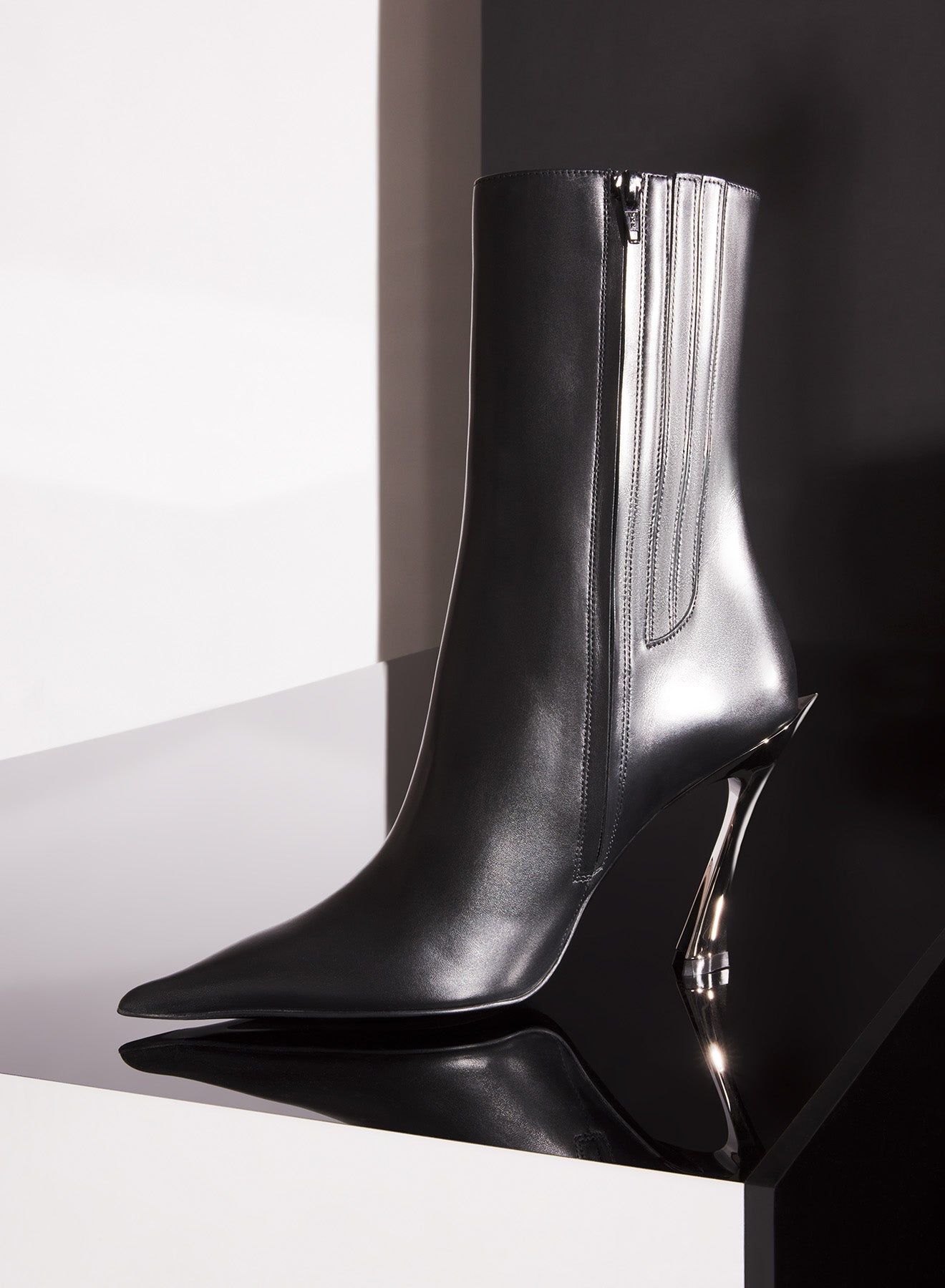 Black leather Fang 95 ankle boots