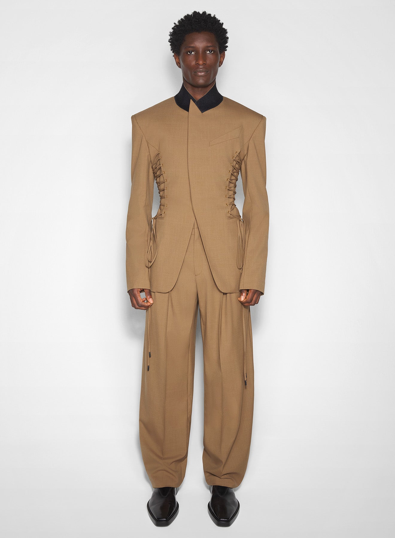beige pleated wide-leg trousers