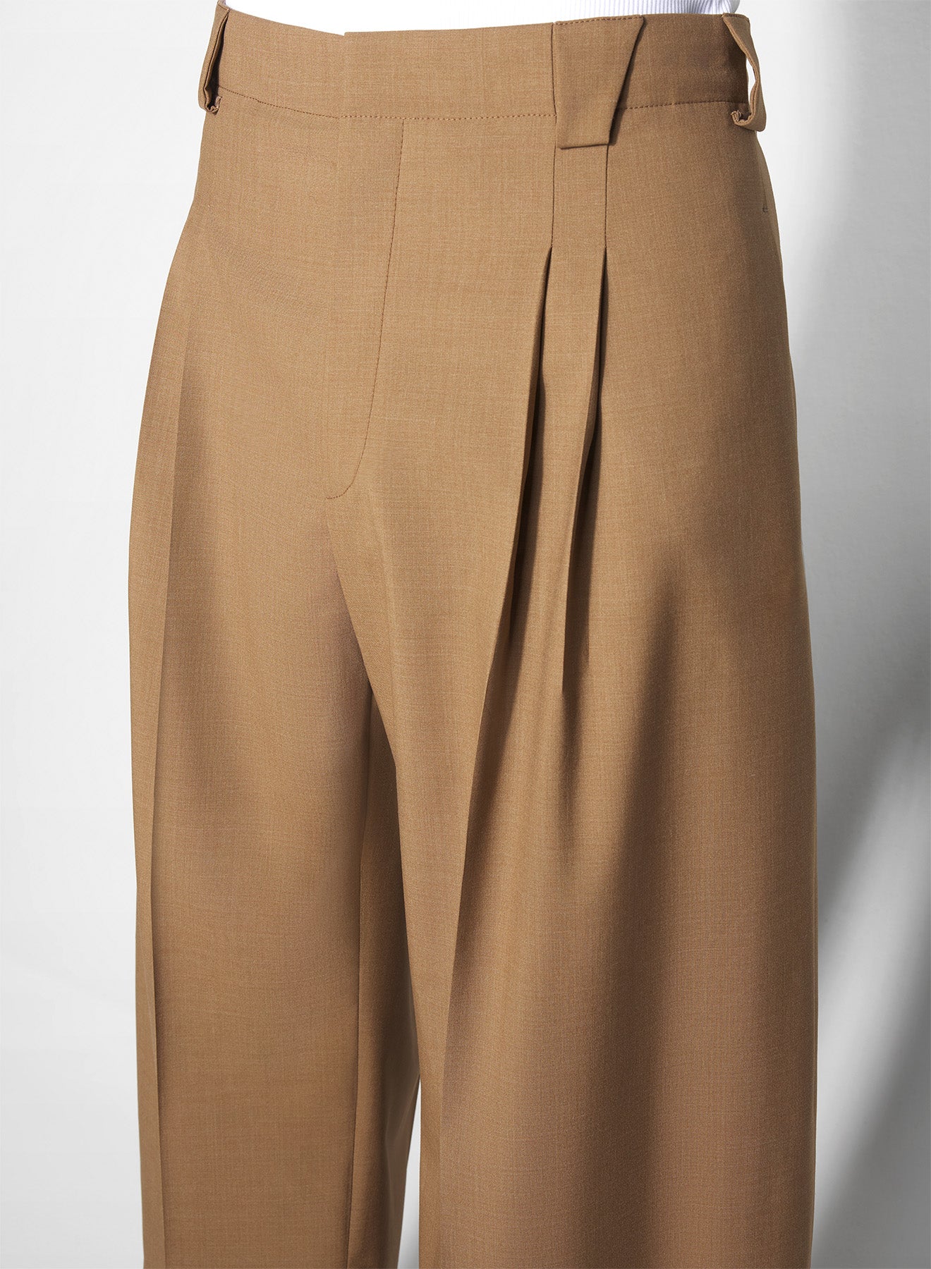 beige pleated wide-leg trousers