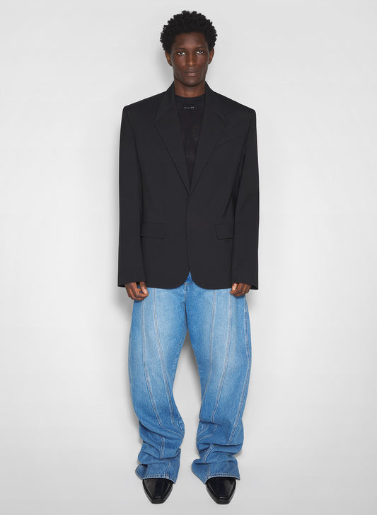washed blue oversized spiral jeans