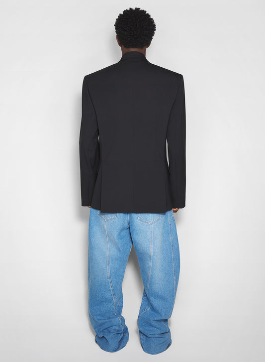 washed blue oversized spiral jeans