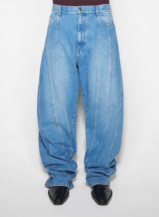 washed blue oversized spiral jeans