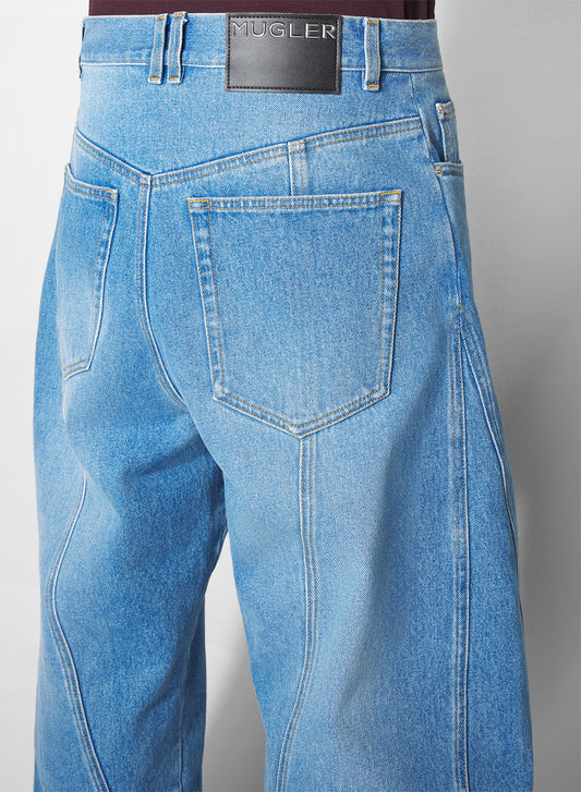 washed blue oversized spiral jeans