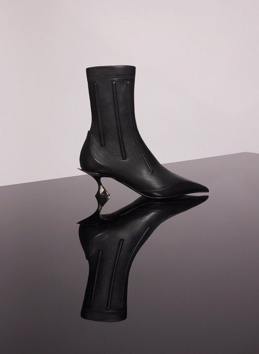 black boned leather fang 55 ankle boots