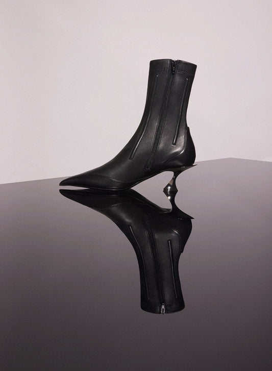 black boned leather fang 55 ankle boots