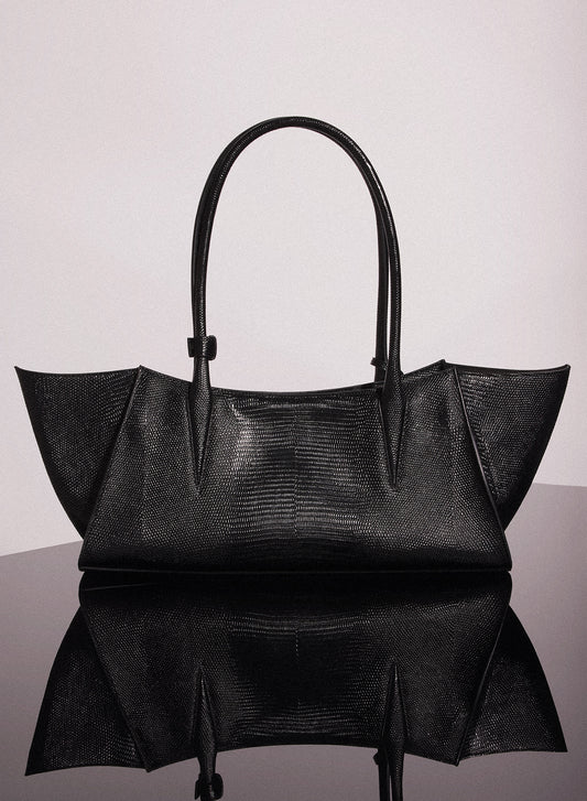 black embossed lizard leather fang bag