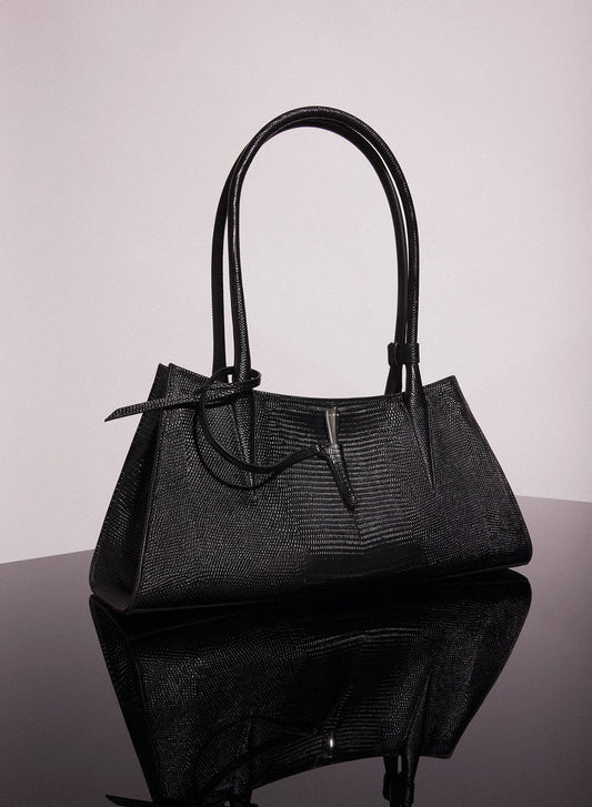 black embossed lizard leather fang bag