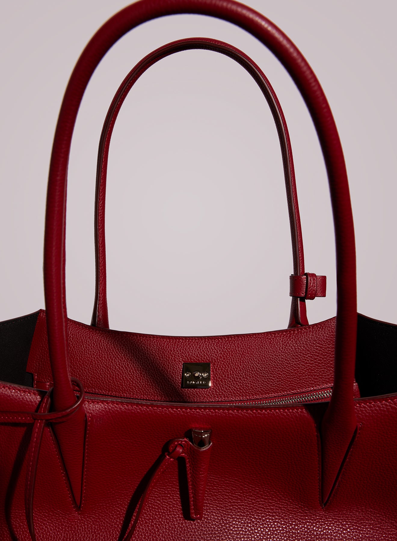 red grained leather fang bag