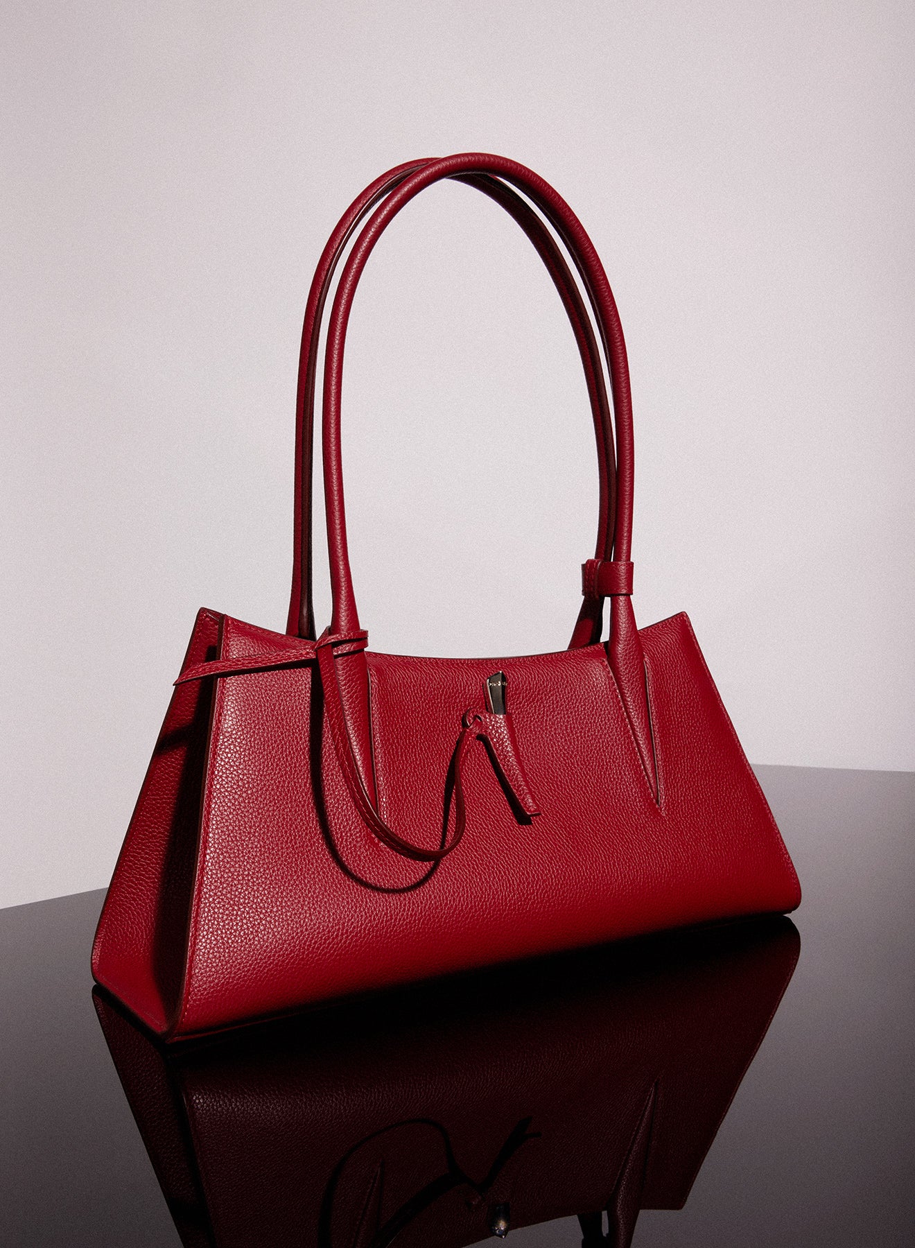 red grained leather fang bag