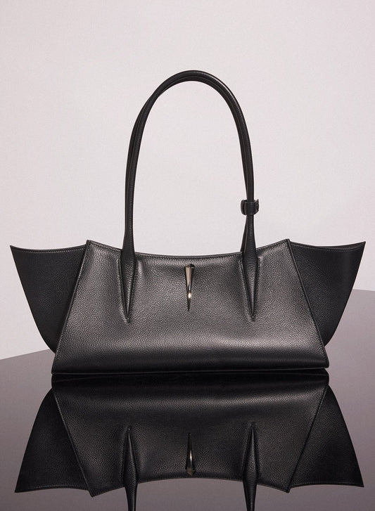 black grainy leather fang bag