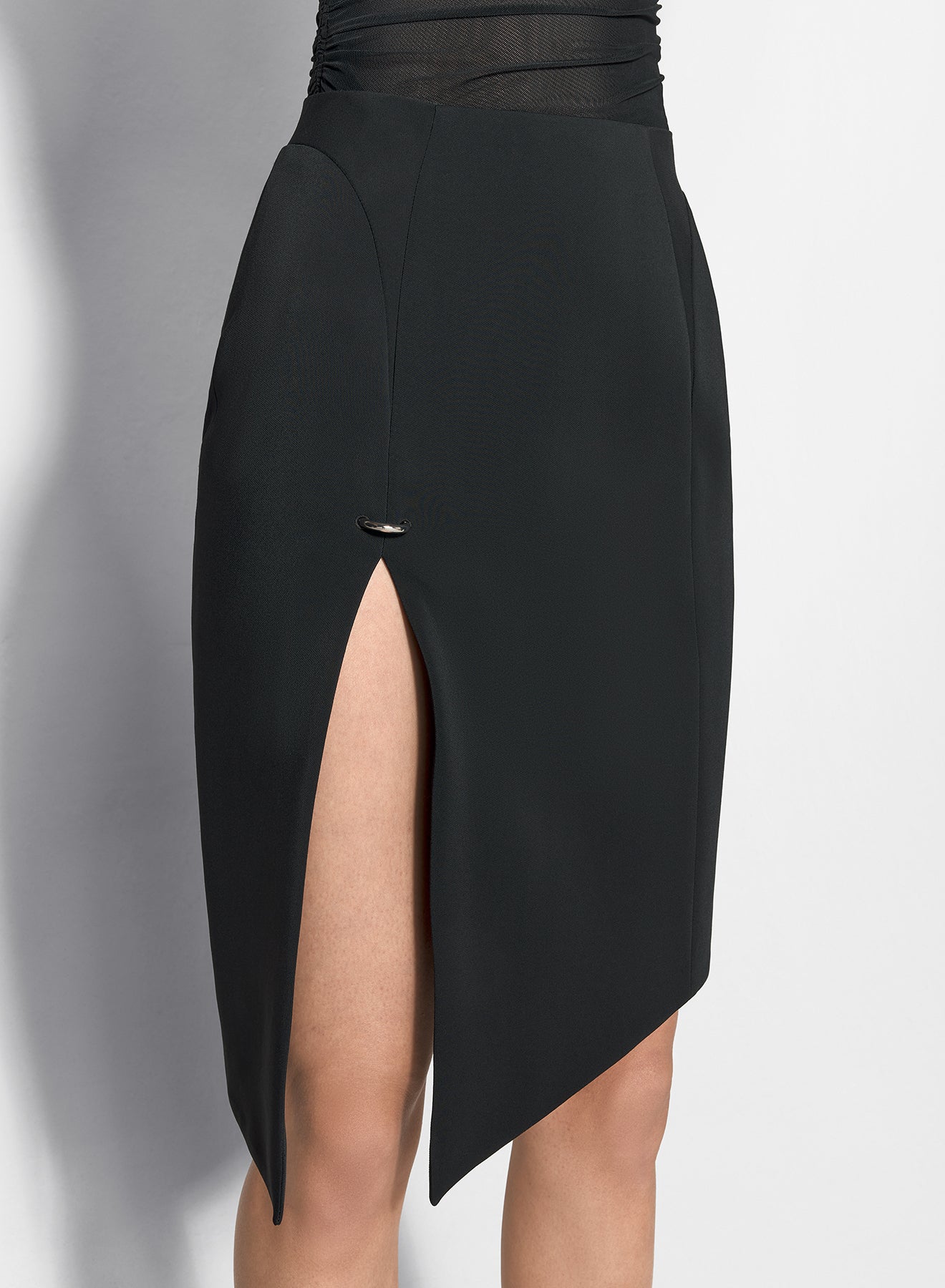 black asymmetrical pierced skirt