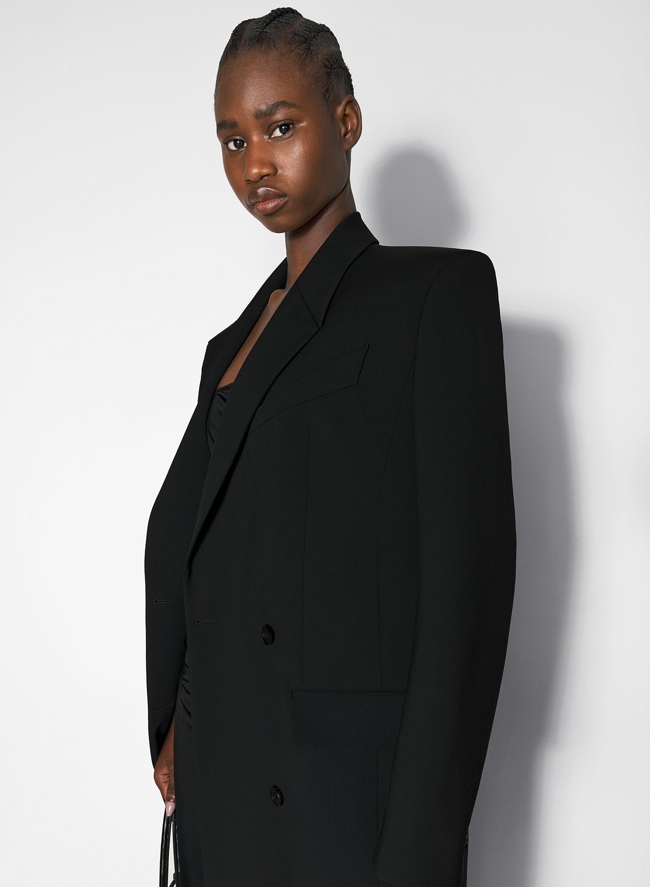 black double-breasted wool coat