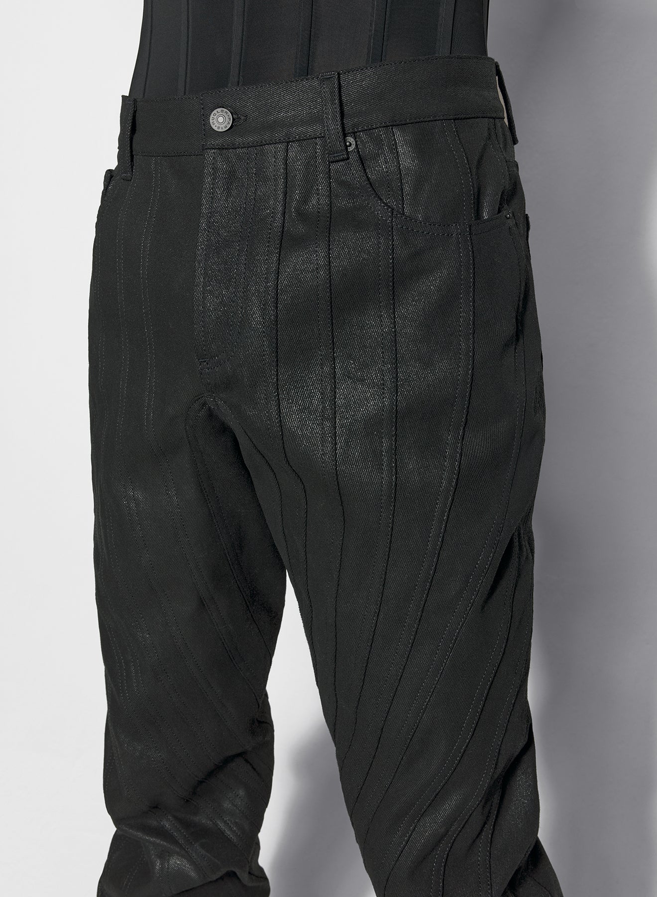 waxed black spiral baggy jeans