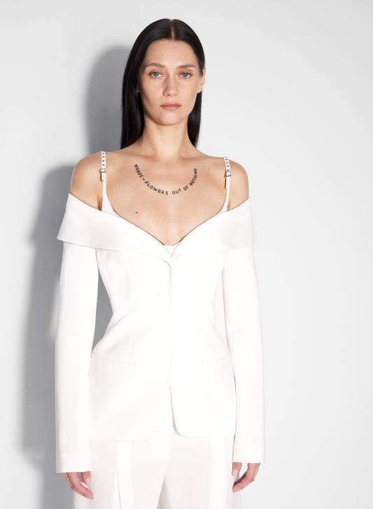 white sculptural off-shoulder jacket