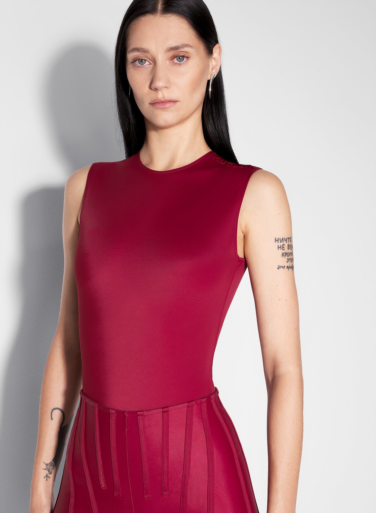 red sleeveless shoulder mugler logo bodysuit